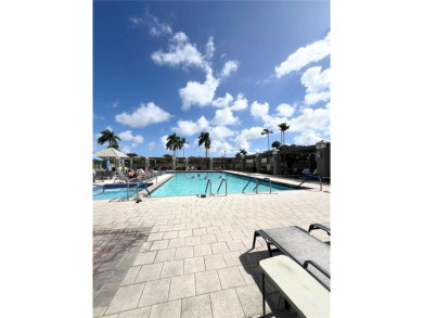 PERFECTION DOES EXIST! COME SEE THIS STUNNING HOME IN THE HEART on Wynmoor Golf Course in Florida - for sale on GolfHomes.com, golf home, golf lot