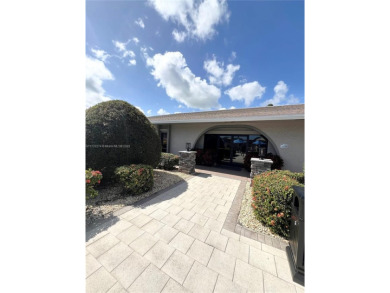 PERFECTION DOES EXIST! COME SEE THIS STUNNING HOME IN THE HEART on Wynmoor Golf Course in Florida - for sale on GolfHomes.com, golf home, golf lot