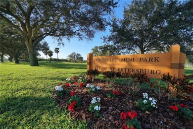 Across the street from GOLF COURSE and Playground ,this charming on Mangrove Bay Golf Course in Florida - for sale on GolfHomes.com, golf home, golf lot