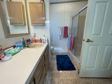 Swiss Golf & Tennis Lot 758 2 bedroom 2 bath 1568 SQ FT Listed on Lake Henry Golf Club in Florida - for sale on GolfHomes.com, golf home, golf lot