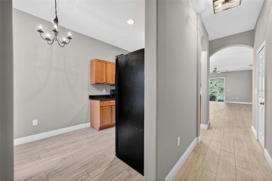 Experience refined comfort and unbeatable value in this on Heritage Isles Golf and Country Club in Florida - for sale on GolfHomes.com, golf home, golf lot