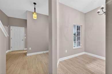 Experience refined comfort and unbeatable value in this on Heritage Isles Golf and Country Club in Florida - for sale on GolfHomes.com, golf home, golf lot