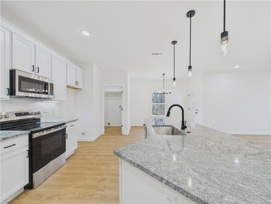 This inviting new construction Bella Vista home sits in a prime on Branchwood Golf Course in Arkansas - for sale on GolfHomes.com, golf home, golf lot