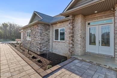 Beautiful brick and stone home with custom upgrades throughout on Tellico Village -The Links At Kahite Golf Course in Tennessee - for sale on GolfHomes.com, golf home, golf lot