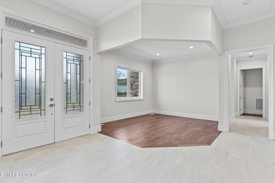 Beautiful brick and stone home with custom upgrades throughout on Tellico Village -The Links At Kahite Golf Course in Tennessee - for sale on GolfHomes.com, golf home, golf lot