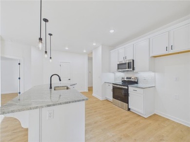 This inviting new construction Bella Vista home sits in a prime on Branchwood Golf Course in Arkansas - for sale on GolfHomes.com, golf home, golf lot