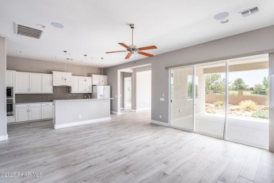 Stunning home located on the Quailwood golf course. This home on Quail Wood Greens Golf Course in Arizona - for sale on GolfHomes.com, golf home, golf lot