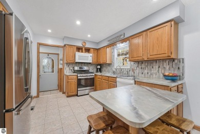 Pride of ownership shines throughout this beautiful home in on Lochen Heath Golf Course in Michigan - for sale on GolfHomes.com, golf home, golf lot