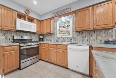 Pride of ownership shines throughout this beautiful home in on Lochen Heath Golf Course in Michigan - for sale on GolfHomes.com, golf home, golf lot