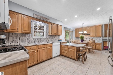 Pride of ownership shines throughout this beautiful home in on Lochen Heath Golf Course in Michigan - for sale on GolfHomes.com, golf home, golf lot