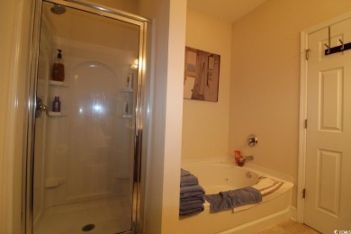 A very special  unique 3 1/2  bedroom 2 1/2  bathroom townhouse on Barefoot Resort and Golf Club  in South Carolina - for sale on GolfHomes.com, golf home, golf lot