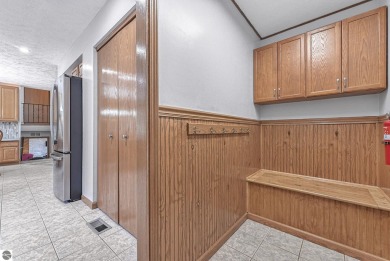 Pride of ownership shines throughout this beautiful home in on Lochen Heath Golf Course in Michigan - for sale on GolfHomes.com, golf home, golf lot