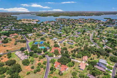 Discover this charming Hill Country Spanish-style Casita on Apple Rock Golf Course - Horseshoe Bay in Texas - for sale on GolfHomes.com, golf home, golf lot