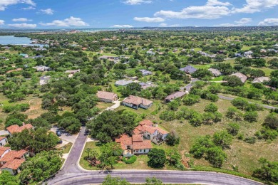 Discover this charming Hill Country Spanish-style Casita on Apple Rock Golf Course - Horseshoe Bay in Texas - for sale on GolfHomes.com, golf home, golf lot