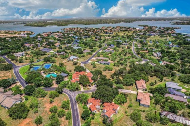 Discover this charming Hill Country Spanish-style Casita on Apple Rock Golf Course - Horseshoe Bay in Texas - for sale on GolfHomes.com, golf home, golf lot