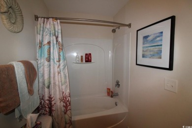 A very special  unique 3 1/2  bedroom 2 1/2  bathroom townhouse on Barefoot Resort and Golf Club  in South Carolina - for sale on GolfHomes.com, golf home, golf lot