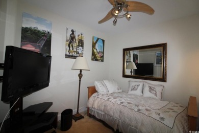 A very special  unique 3 1/2  bedroom 2 1/2  bathroom townhouse on Barefoot Resort and Golf Club  in South Carolina - for sale on GolfHomes.com, golf home, golf lot
