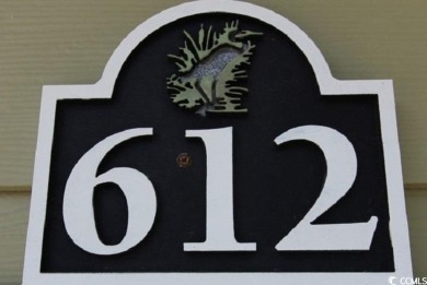 A very special  unique 3 1/2  bedroom 2 1/2  bathroom townhouse on Barefoot Resort and Golf Club  in South Carolina - for sale on GolfHomes.com, golf home, golf lot