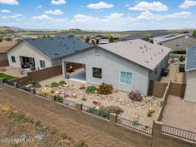 Stunning home located on the Quailwood golf course. This home on Quail Wood Greens Golf Course in Arizona - for sale on GolfHomes.com, golf home, golf lot