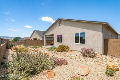 Stunning home located on the Quailwood golf course. This home on Quail Wood Greens Golf Course in Arizona - for sale on GolfHomes.com, golf home, golf lot