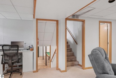 Pride of ownership shines throughout this beautiful home in on Lochen Heath Golf Course in Michigan - for sale on GolfHomes.com, golf home, golf lot