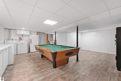 Pride of ownership shines throughout this beautiful home in on Lochen Heath Golf Course in Michigan - for sale on GolfHomes.com, golf home, golf lot
