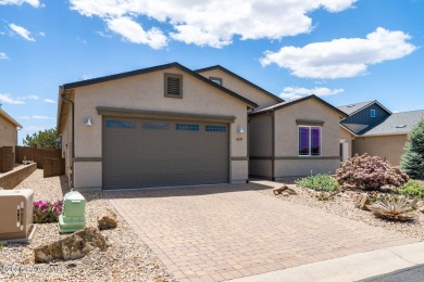 Stunning home located on the Quailwood golf course. This home on Quail Wood Greens Golf Course in Arizona - for sale on GolfHomes.com, golf home, golf lot