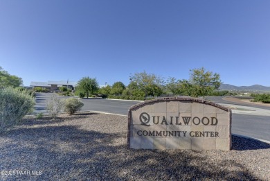 Stunning home located on the Quailwood golf course. This home on Quail Wood Greens Golf Course in Arizona - for sale on GolfHomes.com, golf home, golf lot