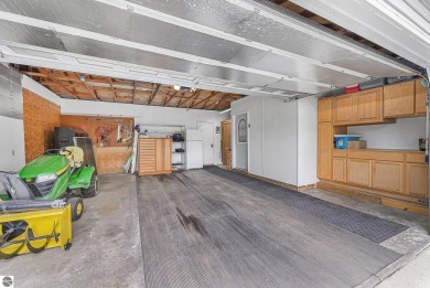 Pride of ownership shines throughout this beautiful home in on Lochen Heath Golf Course in Michigan - for sale on GolfHomes.com, golf home, golf lot