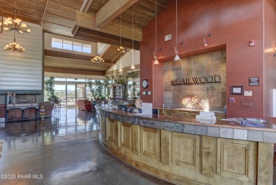 Stunning home located on the Quailwood golf course. This home on Quail Wood Greens Golf Course in Arizona - for sale on GolfHomes.com, golf home, golf lot