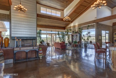 Stunning home located on the Quailwood golf course. This home on Quail Wood Greens Golf Course in Arizona - for sale on GolfHomes.com, golf home, golf lot