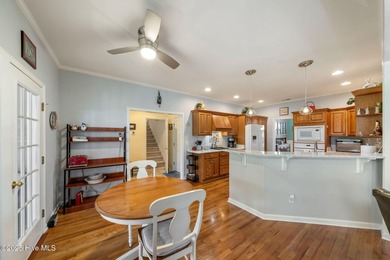 This beautifully maintained 3-bedroom, 2.5-bathroom home offers on Members Club At St. James Plantation in North Carolina - for sale on GolfHomes.com, golf home, golf lot