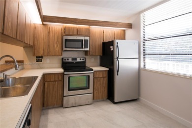Remodeled, oversized corner unit with 2 bedrooms, large closets on Pine Island Ridge Country Club in Florida - for sale on GolfHomes.com, golf home, golf lot