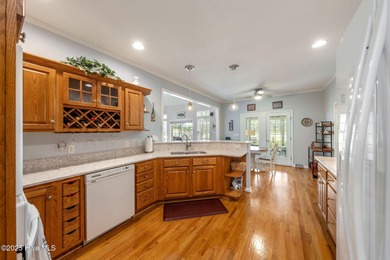 This beautifully maintained 3-bedroom, 2.5-bathroom home offers on Members Club At St. James Plantation in North Carolina - for sale on GolfHomes.com, golf home, golf lot