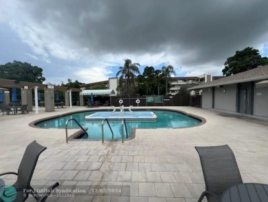 *PRICE REDUCTION!!!*  Come enjoy this amazing Oasis in Coconut on Wynmoor Golf Course in Florida - for sale on GolfHomes.com, golf home, golf lot