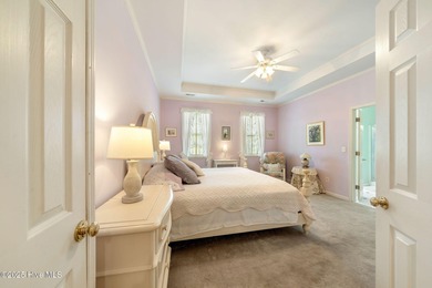 This beautifully maintained 3-bedroom, 2.5-bathroom home offers on Members Club At St. James Plantation in North Carolina - for sale on GolfHomes.com, golf home, golf lot