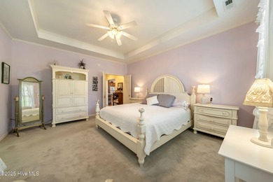 This beautifully maintained 3-bedroom, 2.5-bathroom home offers on Members Club At St. James Plantation in North Carolina - for sale on GolfHomes.com, golf home, golf lot