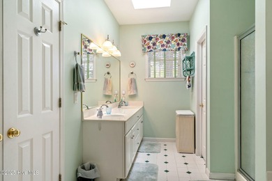 This beautifully maintained 3-bedroom, 2.5-bathroom home offers on Members Club At St. James Plantation in North Carolina - for sale on GolfHomes.com, golf home, golf lot