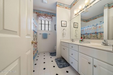 This beautifully maintained 3-bedroom, 2.5-bathroom home offers on Members Club At St. James Plantation in North Carolina - for sale on GolfHomes.com, golf home, golf lot