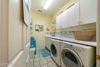 This beautifully maintained 3-bedroom, 2.5-bathroom home offers on Members Club At St. James Plantation in North Carolina - for sale on GolfHomes.com, golf home, golf lot