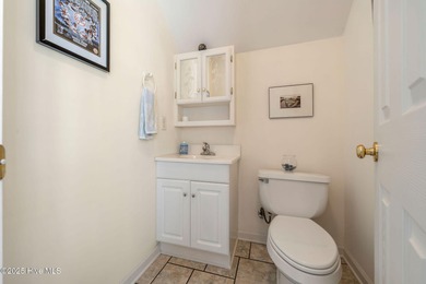 This beautifully maintained 3-bedroom, 2.5-bathroom home offers on Members Club At St. James Plantation in North Carolina - for sale on GolfHomes.com, golf home, golf lot