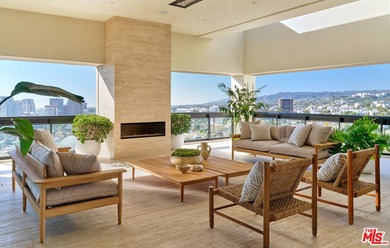 High above the city, at the very crown of the iconic Wilshire on Los Angeles Country Club in California - for sale on GolfHomes.com, golf home, golf lot