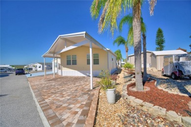 LOOK NO FURTHER...FLORIDA LIFESTYLE AT ITS BEST! THIS 2012 on Southern Dunes Golf and Country Club in Florida - for sale on GolfHomes.com, golf home, golf lot