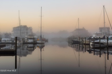 This beautifully maintained 3-bedroom, 2.5-bathroom home offers on Members Club At St. James Plantation in North Carolina - for sale on GolfHomes.com, golf home, golf lot