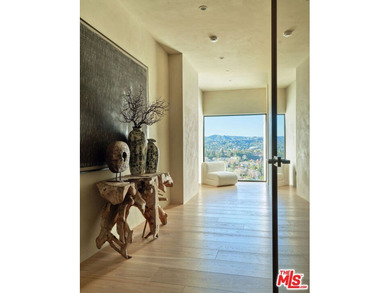 High above the city, at the very crown of the iconic Wilshire on Los Angeles Country Club in California - for sale on GolfHomes.com, golf home, golf lot