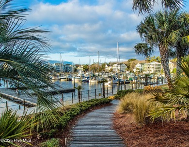 This beautifully maintained 3-bedroom, 2.5-bathroom home offers on Members Club At St. James Plantation in North Carolina - for sale on GolfHomes.com, golf home, golf lot