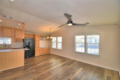 LOOK NO FURTHER...FLORIDA LIFESTYLE AT ITS BEST! THIS 2012 on Southern Dunes Golf and Country Club in Florida - for sale on GolfHomes.com, golf home, golf lot