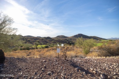 Nestled in a serene, gated community on a elevated lot on Gold Canyon Golf Resort - Dinosaur Mountain in Arizona - for sale on GolfHomes.com, golf home, golf lot