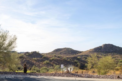 Nestled in a serene, gated community on a elevated lot on Gold Canyon Golf Resort - Dinosaur Mountain in Arizona - for sale on GolfHomes.com, golf home, golf lot