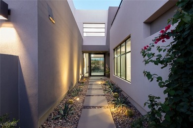 Built by Blue Heron, this modern architectural masterpiece in on Rio Secco Golf Club in Nevada - for sale on GolfHomes.com, golf home, golf lot